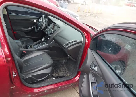 2013 Ford Focus Titanium z USA, uszkodzony, nr VIN 1FADP3N23DL274828